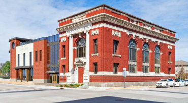 Children's Museum of Rock County Updated Renderings Include Red Brick of Original First National Bank Building